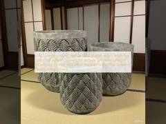 GRCポット グレーの丸い繊維セメントプランター 繰り返しパーム葉のパターン 軽量 耐久性 低保養性 花のポット 休日 ビラ オフィス装飾 屋根裏庭園 景観設計プロジェクト