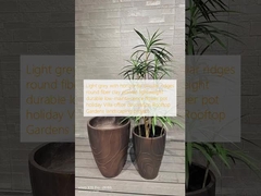 円状の横軸の横軸の緑灰色 丸い繊維粘土の植樹 軽量 耐久性 低保養性 花盆 休日 ビラ オフィス装飾 屋根裏庭園 景観設計 プロジェクト