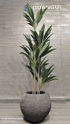 グレーテクスチャードラウンドファイバークレイプランター、天然石のような模様